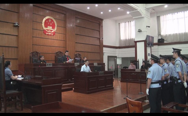 审判长宣读判决。益阳法院网站 审判长宣读判决。益阳法院网站