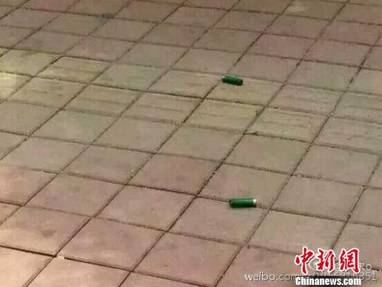 枪击案现场留下的弹壳 穆玉良 摄 枪击案现场留下的弹壳 穆玉良 摄