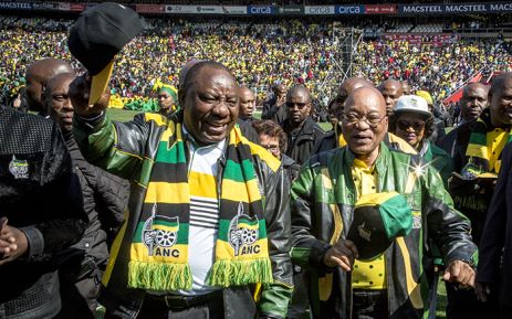President Jacob Zuma and Deputy President Cyril Ramaphosa wave to the thousands of ANC supporters in the Emirates Airline Park in Johannesburg for the party