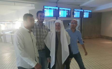 Sheikh Abdul Salam Bassiouni, second from right, surrounded by relatives at OR Tambo International Airport. Picture: Facebook.com.