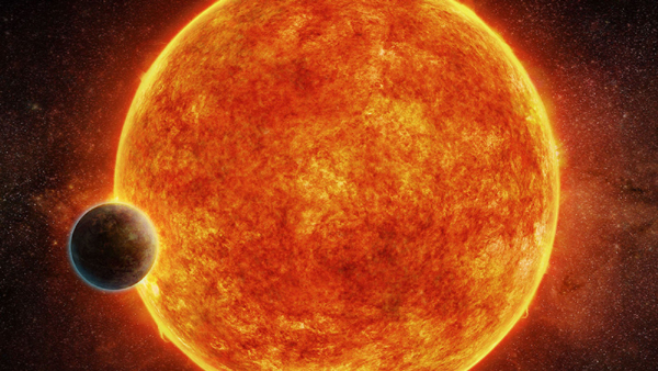 科学家畅想“超级地球”经过其主恒星前面的场景。