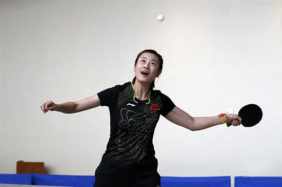 女乒大满贯得主丁宁在表演赛中。 新华网 图