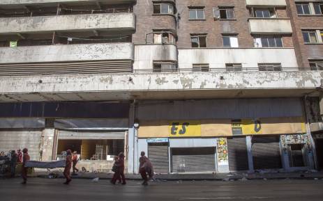 FILE: Red Ants evict residents of a block of flats on Harrison Street in Jeppestown. Picture: Thomas Holder/EWN