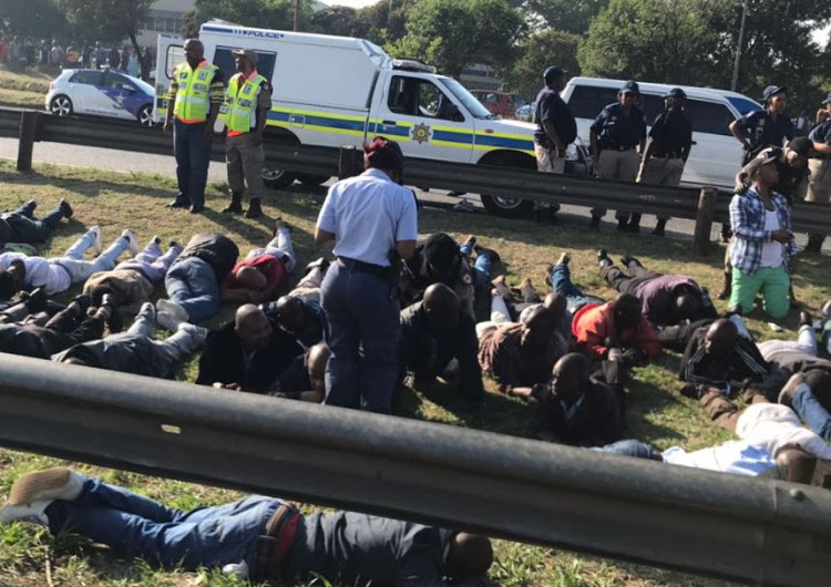 Police arrested 29 people believed to be taxi driver for blocking the R21 to OR Tambo International Airport.