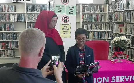 Amr Salie reads from his first book, 'Blameless' during the launch at the Lansdowne library. Picture: facebook.com