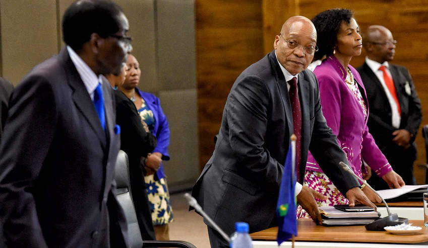 Photo: President Jacob Zuma during the SADC Extraordinary Double Troika Summit in Pretoria, South Africa. On the left is President Robert Mugabe, Chairperson of the SADC Troika meeting and in the background is Minister of International Relations and Cooperation of South Africa Ms Maite Nkoana-Mashabane, 20 February 2015. (GCIS)