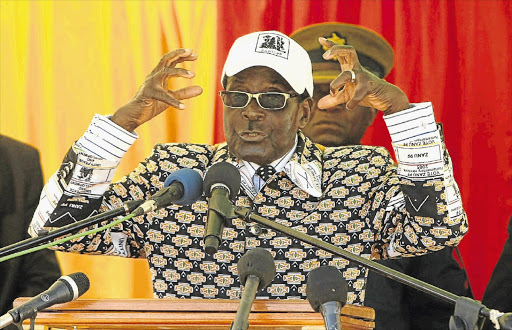 Robert Mugabe addresses supporters at the White City Stadium in Bulawayo. File photo.