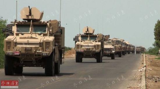 资料图：行驶在也门境内的沙特联军装甲车队。
