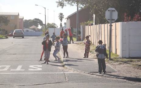 FILE: Children play in the street outside Zeekoevlei primary school in Lotus River Cape Town. EWN looks at how NGO Hope House is making a difference in drug-ridden communities. Picture: Bertram Malgas/EWN