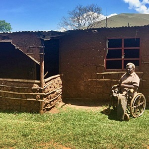 Mbuso “British” Mkhize outside his home. (Nompendulo Ngubane/GroundUp) 