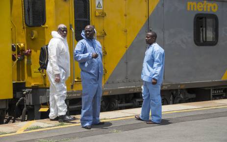 Officials and rescue services personnel on the scene of a train collision in Germiston on 9 January 2018. Picture: Ihsaan Haffejee/EWN.