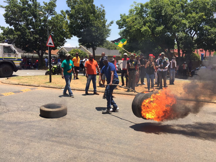 Police fired stun grenades to break up a clash with EFF protesters outside Hoërskool Overvaal in Gauteng on 17 January 2017.