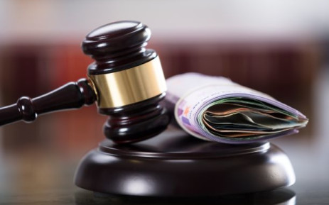 Court gavel and banknotes. Image: 123rf.com