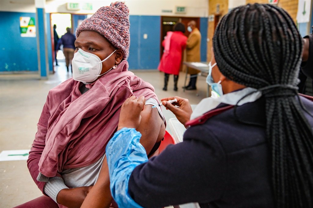 Teachers at the Rabasotho Community Hall vaccination site in Tembisa on 23 June 2021.