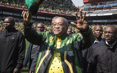 President Jacob Zuma waves to the thousands of supporters at the Emirates Airline Park in Johannesburg for the party