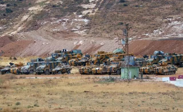 ▲10月9日，土耳其军车在土叙边境集结。 图/新华社